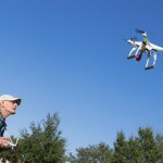 man controlling a drone